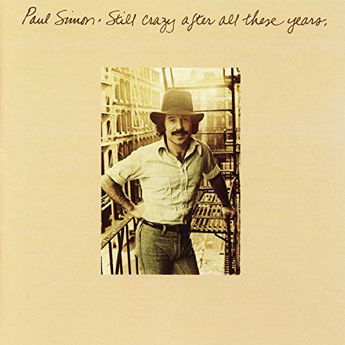 Paul Simon album cover: sepia-toned portrait of a man with a hat.