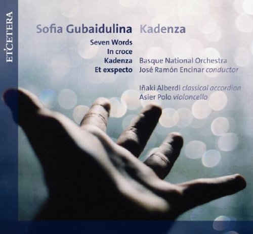 CD cover: hand reaching upwards with blurred lights, text details composers & performers.