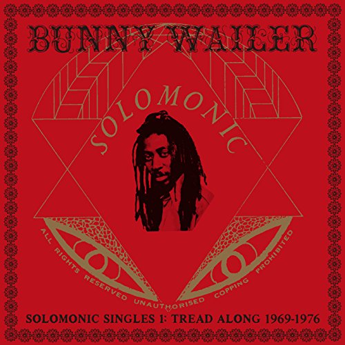 Bunny Wailer album cover, red background, portrait, geometric designs.