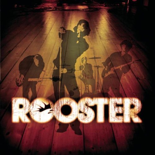 Silhouetted band performing onstage with the album title "Rooster" in red.