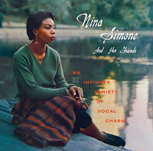 Nina Simone album cover, portrait of singer with text overlay.