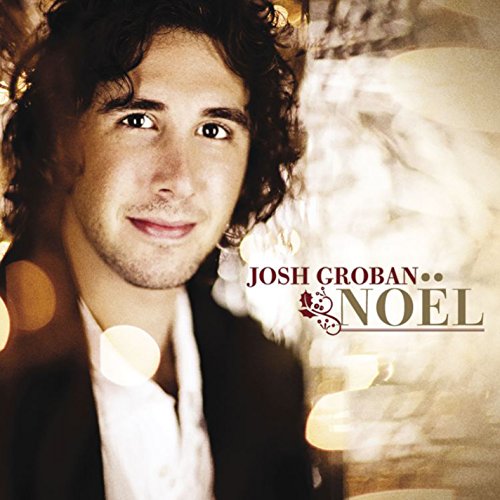 Josh Groban album cover, "Noel," featuring a portrait with holiday lights.