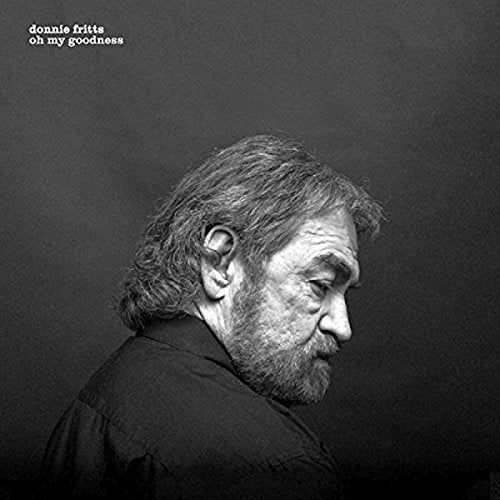 Black and white portrait of Donnie Fritts, a bearded man in profile.