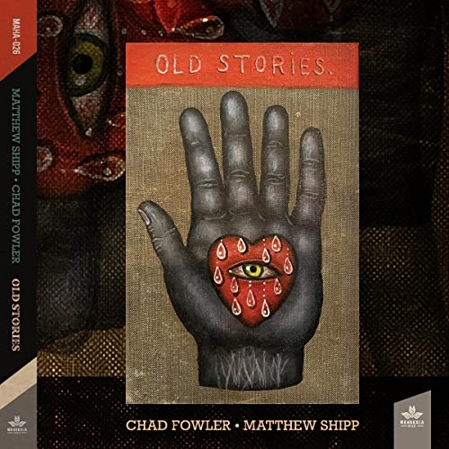 CD cover: a dark hand holds a red heart with an eye, titled "Old Stories".