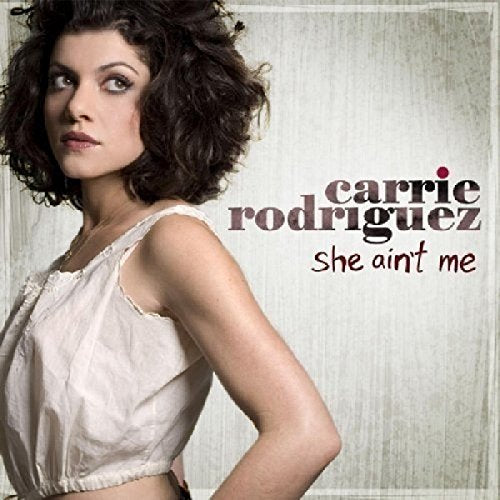 CD cover for Carrie Rodriguez’s “She Ain’t Me” featuring her portrait.