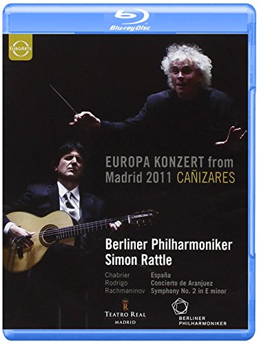 Blu-ray case featuring a conductor and guitarist performing onstage.