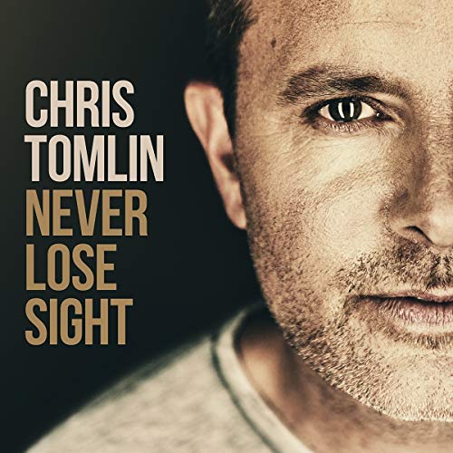 Close-up of Chris Tomlin with album title "Never Lose Sight" text.