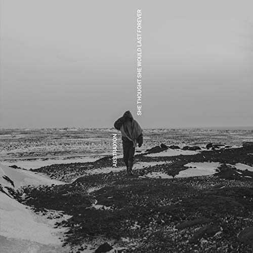 Black and white album cover with a lone figure walking towards a snowy landscape.