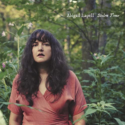 Album cover for Lapell’s “Stolen Time” featuring a woman in a garden.