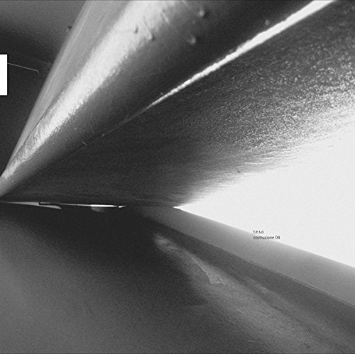 Black and white abstract image of an underpass or tunnel interior.