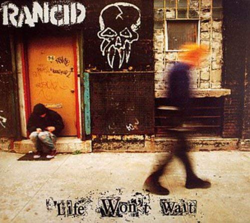 Album cover showing a person sitting by a door and a blurred walking figure.