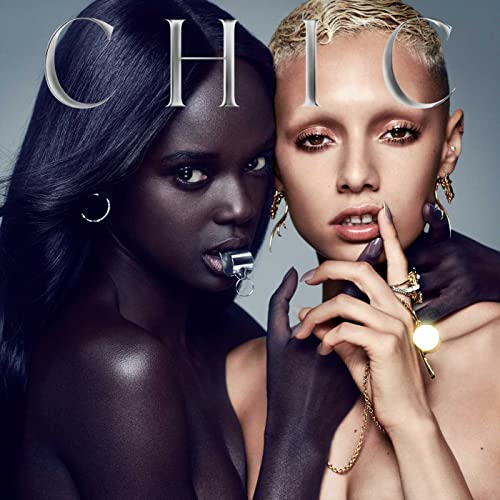 CD cover featuring two models with dramatic makeup and jewelry.