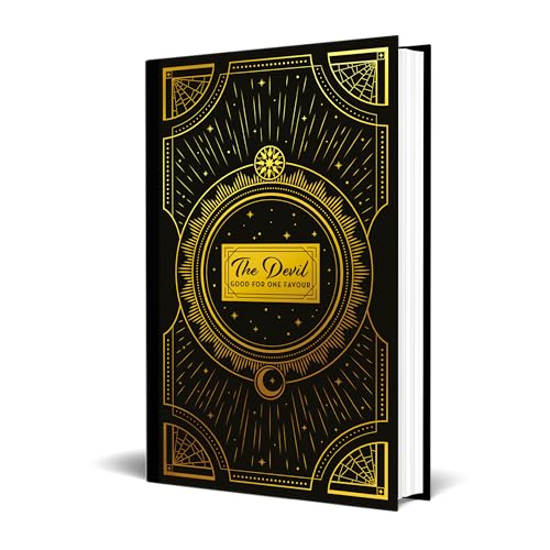 Black hardcover book with gold celestial and ornate designs.