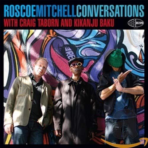 CD cover featuring three musicians against a colorful, abstract mural.