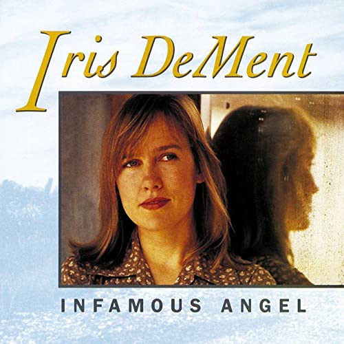 Album cover for Iris DeMent’s “Infamous Angel” featuring her portrait.
