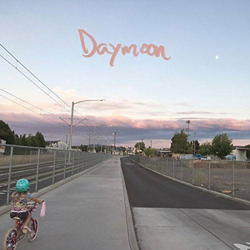 Album cover: child on bike riding along a path under a pink sky.