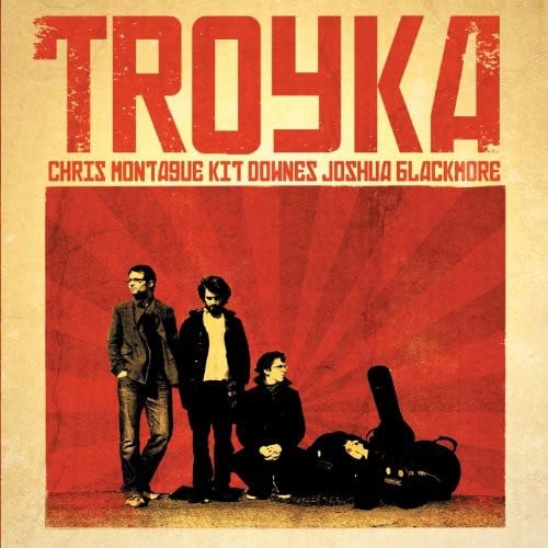 CDSCSCSSHCD cover with red text and four men against a red sunburst.