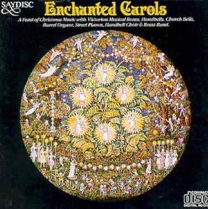 CD cover for "Enchanted Carols" with a detailed floral and figure illustration.