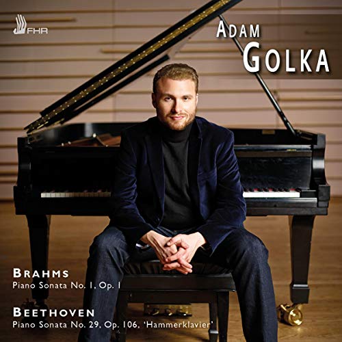 Adam Golka portrait at a grand piano, album cover for Brahms and Beethoven sonatas.