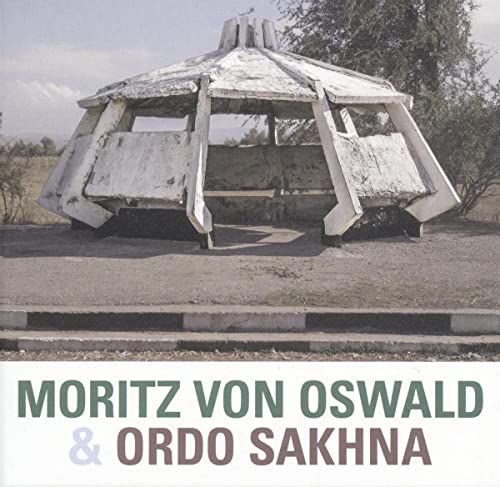 White, geometric structure in a desert landscape; album cover for Moritz Von Oswald & Ordo Sakhna.