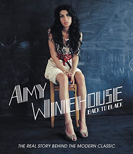 Amy Winehouse sits on a stool in front of a chalkboard, DVD cover.