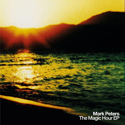 Album cover for Mark Peters’ “The Magic Hour” featuring a sunset over water.