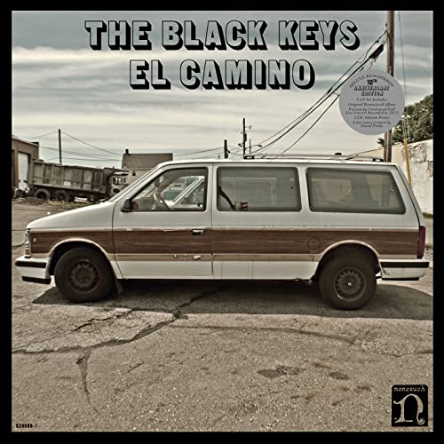 CD cover for The Black Keys’ “El Camino” featuring a wood-paneled van.