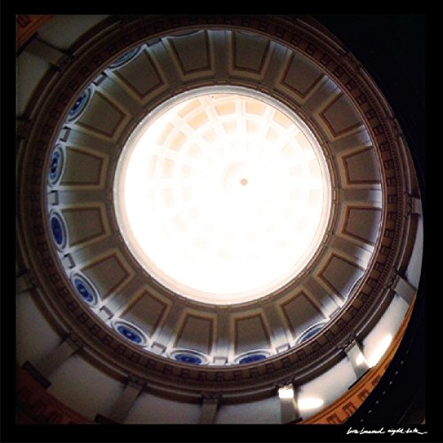 Circular architectural detail with a bright, central skylight.