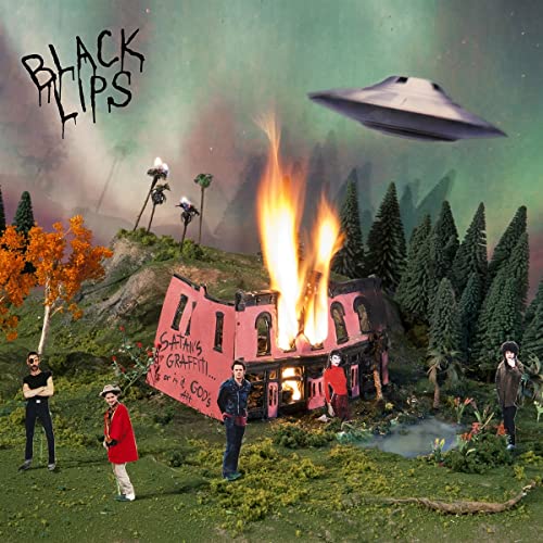 Album cover with a burning building, UFO, and band members.
