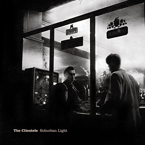 Black and white album cover with a man seen through a shop window.