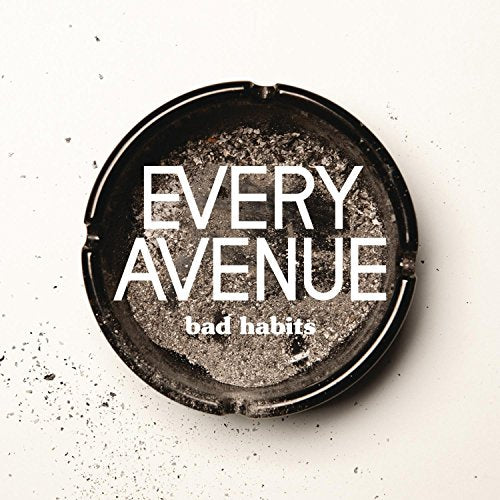 An ashtray filled with ash on a white background with album text overlaid.