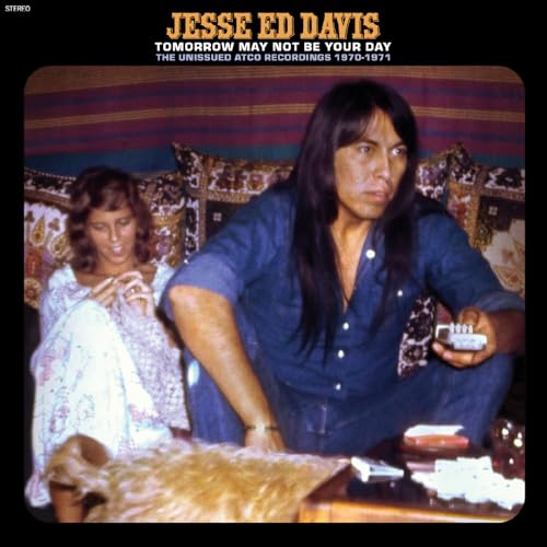 Jesse Ed Davis album cover featuring a man and woman in a room.