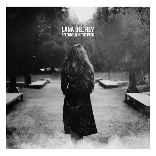 Lana Del Rey album cover, woman seen from behind in a park.