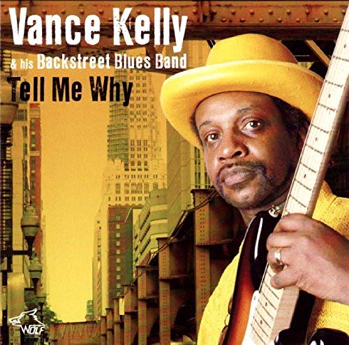 CD cover featuring Vance Kelly with guitar, yellow hat, and city backdrop.