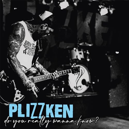 Black and white album cover featuring a tattooed musician playing guitar.