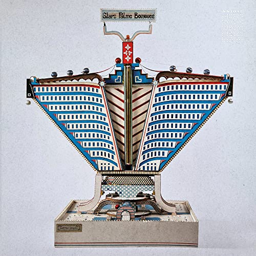A complex, symmetrical architectural model with blue and white patterns on a light background.