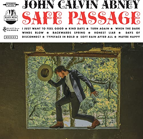 CD cover: man in suit running through a window frame.