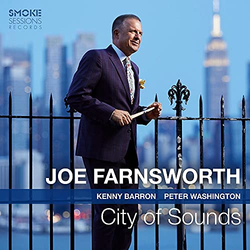 Joe Farnsworth album cover with musician in suit and city skyline.