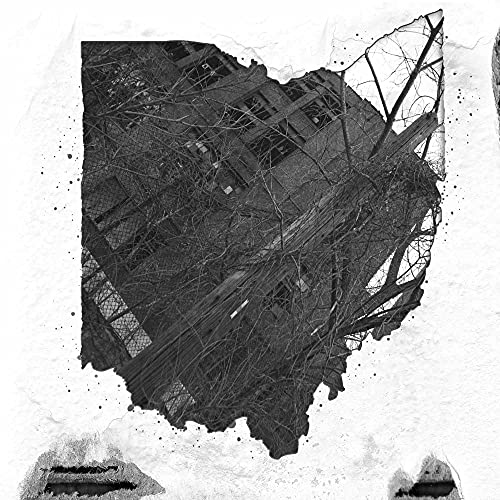 Black and white abstract image of a building with torn edges.