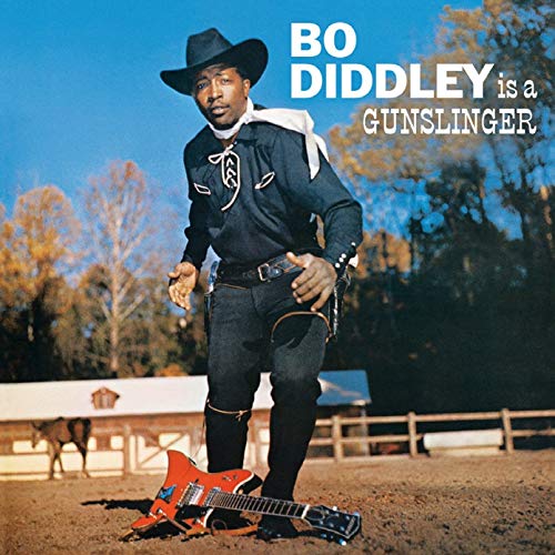 Bo Diddley in cowboy attire, album cover with a red guitar.