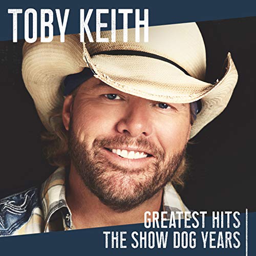 Toby Keith wearing a cowboy hat on a music album cover.