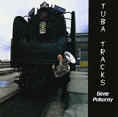 CD cover featuring a tuba player in front of a steam locomotive.