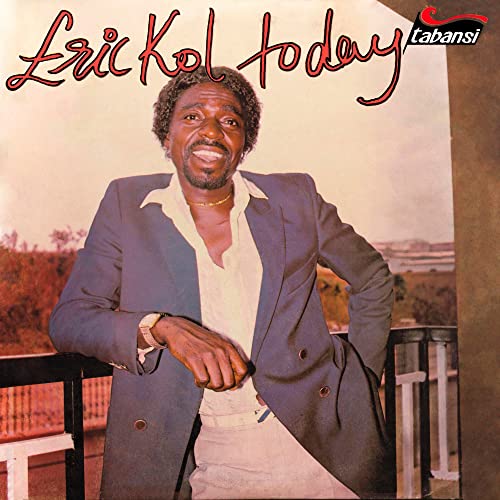 CD cover featuring Eric Koleric, a man in a suit, smiling.