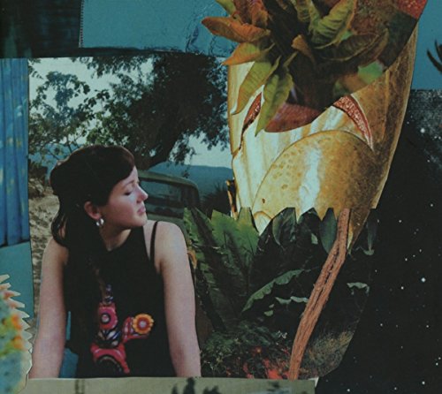 CD cover featuring a woman’s profile and collage artwork.