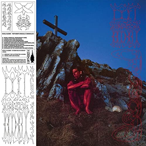 Vinyl album cover: red-skinned figure on a rocky hill with a cross.