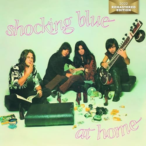 Shocking Blue album cover: four people with instruments and scattered objects.
