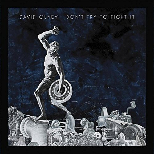 CD cover: statue of a man amidst industrial machinery, dark blue background.