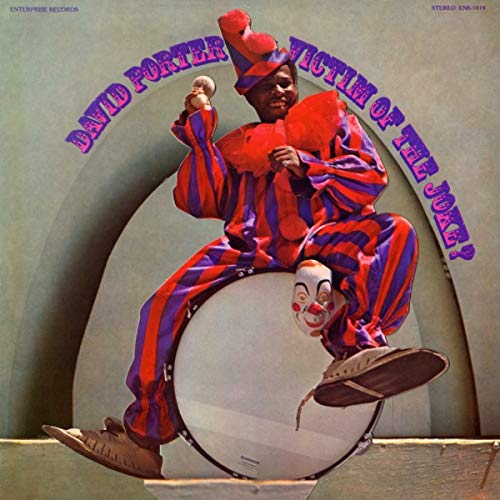 Album cover: David Porter as a clown seated on a drum.