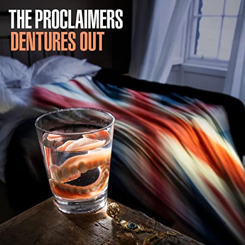 Album cover for The Proclaimers’ “Dentures Out” featuring dentures in a glass.