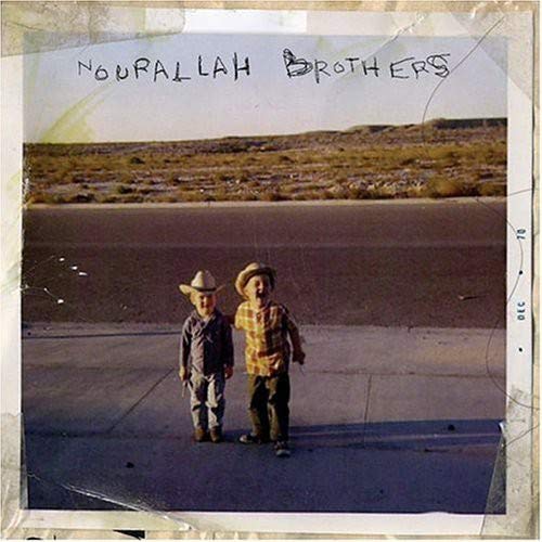 CD cover with two young boys in cowboy hats standing outdoors.